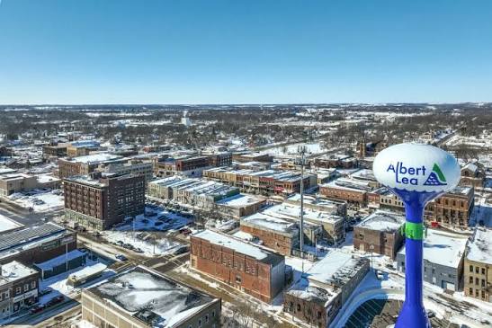 Aerial view of Albert Lea's downtown district in winter with the branded water tower