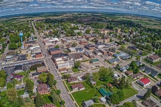 Aerial view of Caledonia, Minnesota's small-town Main Street surrounded by farmland